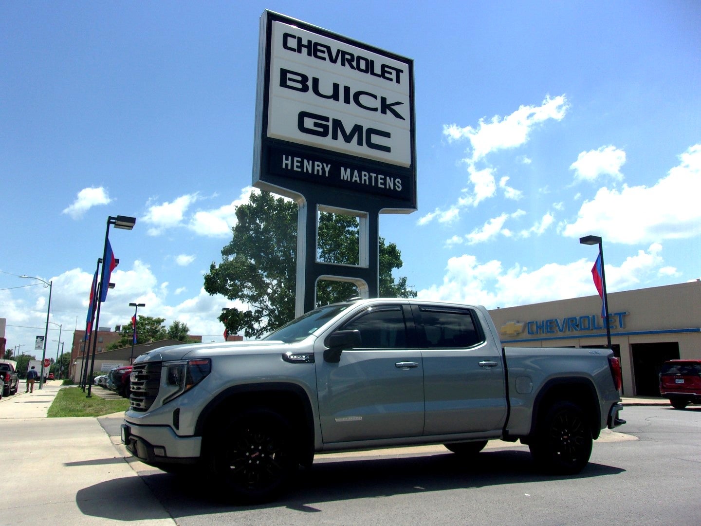 2025 GMC Sierra 1500 Elevation in Sterling Metallic — front three-quarter view