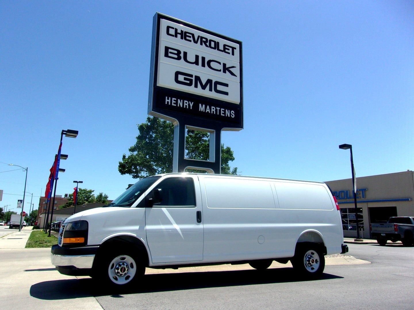 2026 GMC Savana Cargo Work Van in Summit White — front three-quarter view