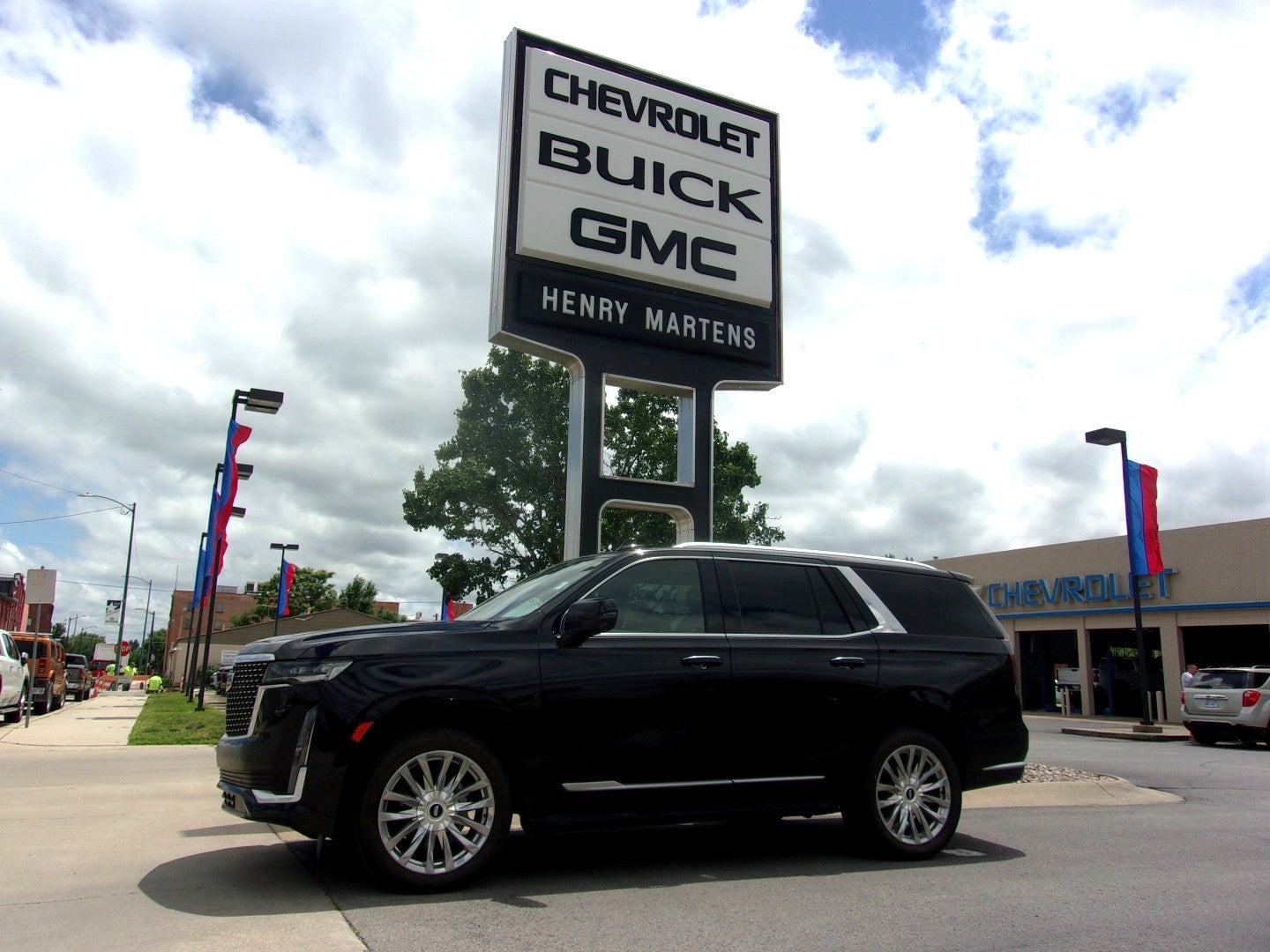 2023 Cadillac Escalade Premium Luxury in Black Raven — front three-quarter view