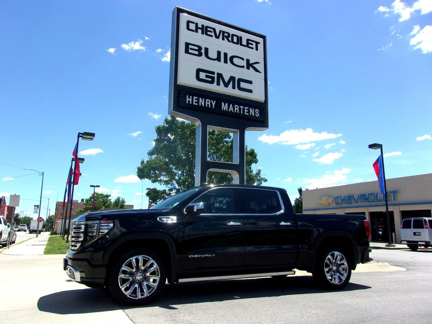 2024 GMC Sierra 1500 Denali in Onyx Black — front three-quarter view